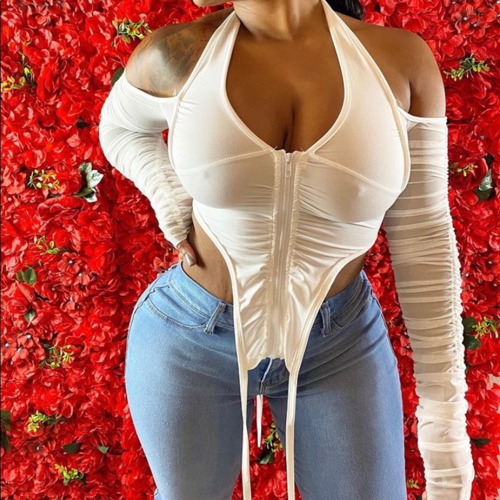 White off the should shirt